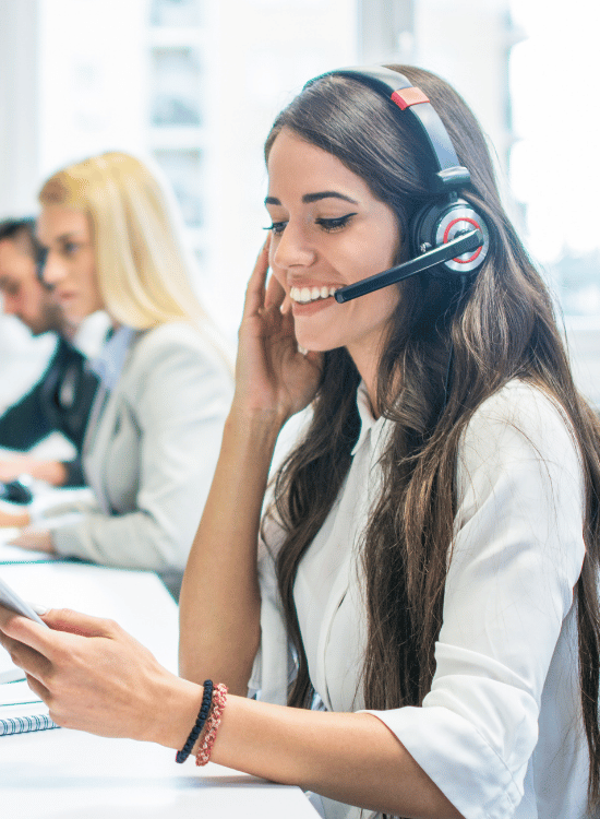 Illustrative image showing customer support worker talking on the phone
